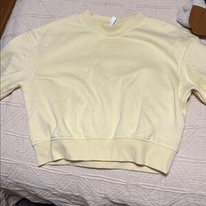 Butter yellow Cropped Sweatshirt
Never worn